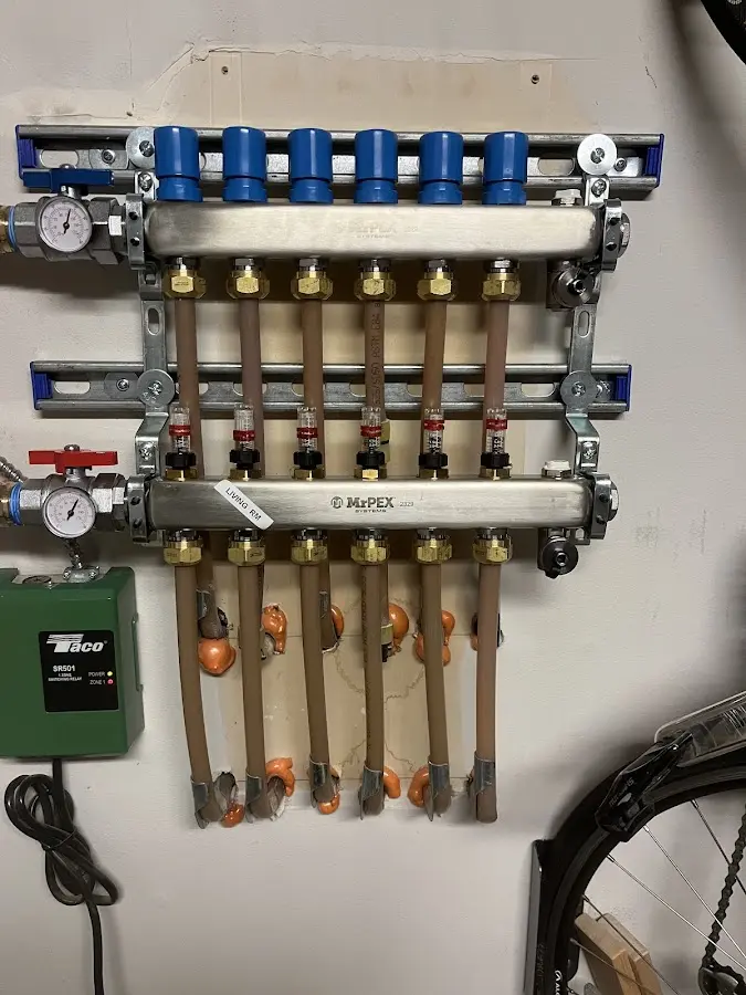 Plumber performing Water Heater Repair at a residential property in Palacios